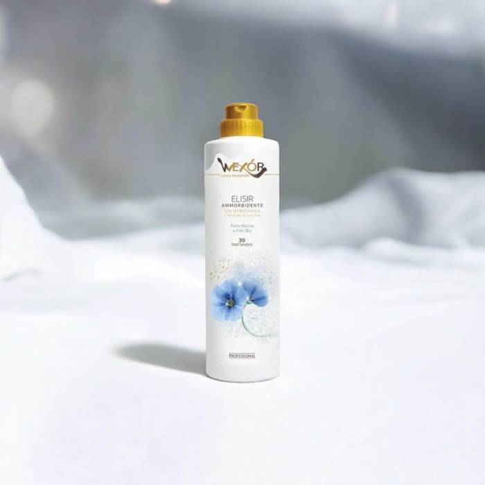 Zdjęcie produktu Wexor Elisir Ammorbidente Fiori Blu 750 ml – butelka premium płynu do płukania tkanin z mikrokapsułkami i proteinami jedwabiu, morski zapach felce marina i fiori blu, do 30 prań.
